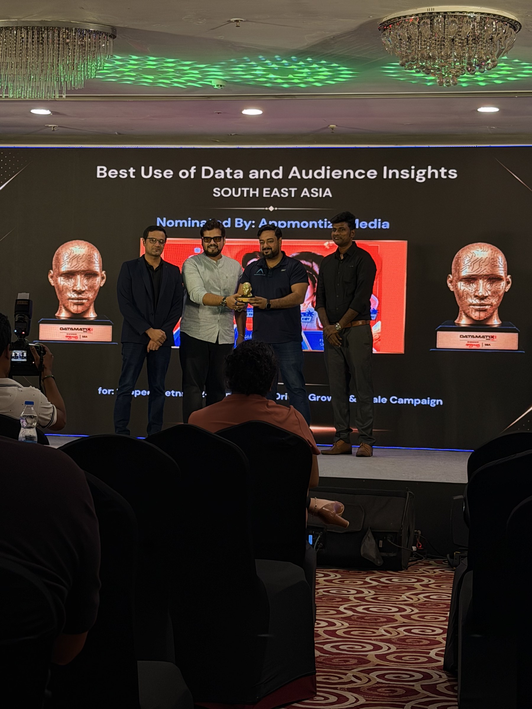 Appmontize collecting the Best Use of Data and Audience Insights award for Shopee, Southeast Asia, on stage at DATAMATIX Asia 2026